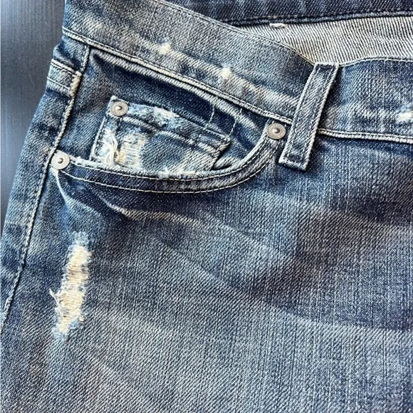 7 For All Mankind distressed boot cut blue jeans size 29.