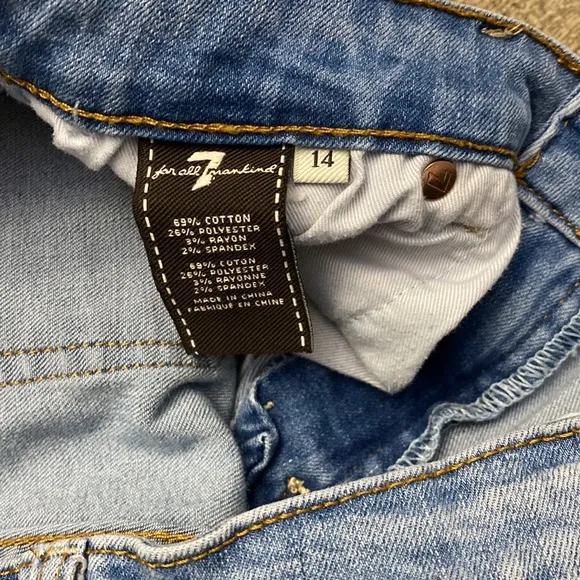 7 For all mankind jeans with Distressed around the Knee  area and back legs
