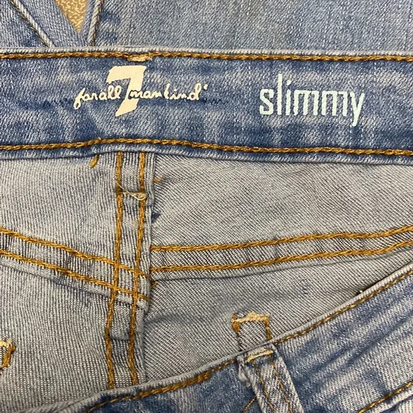 7 For all mankind jeans with Distressed around the Knee  area and back legs