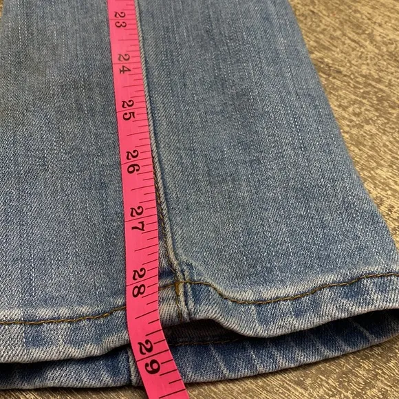 7 For all mankind jeans with Distressed around the Knee  area and back legs