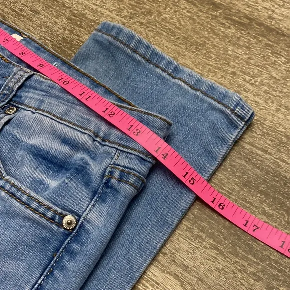 7 For all mankind jeans with Distressed around the Knee  area and back legs