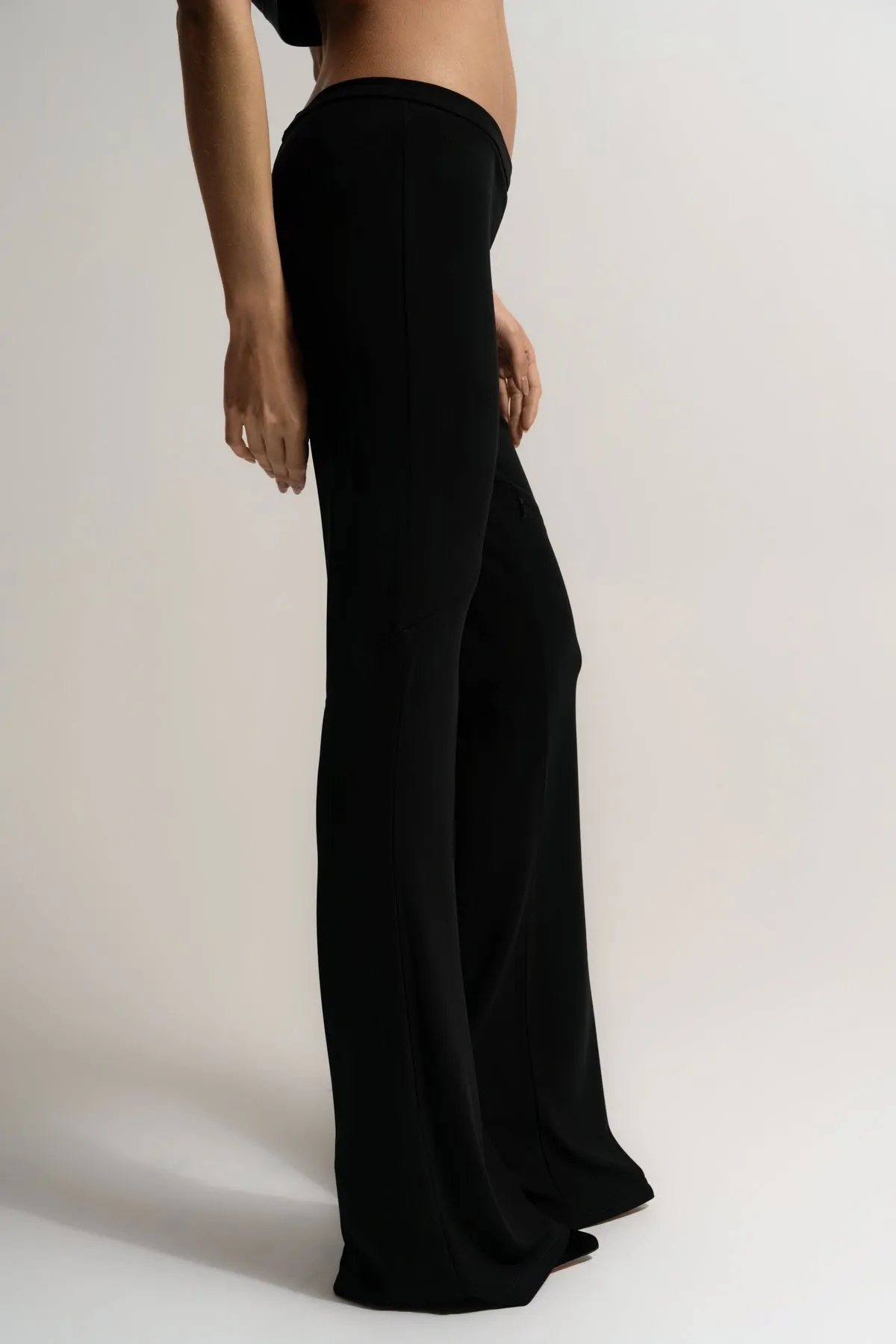 COURRÈGES | ELLIPSE ZIPPED CREPE JERSEY BOOTCUT PANTS