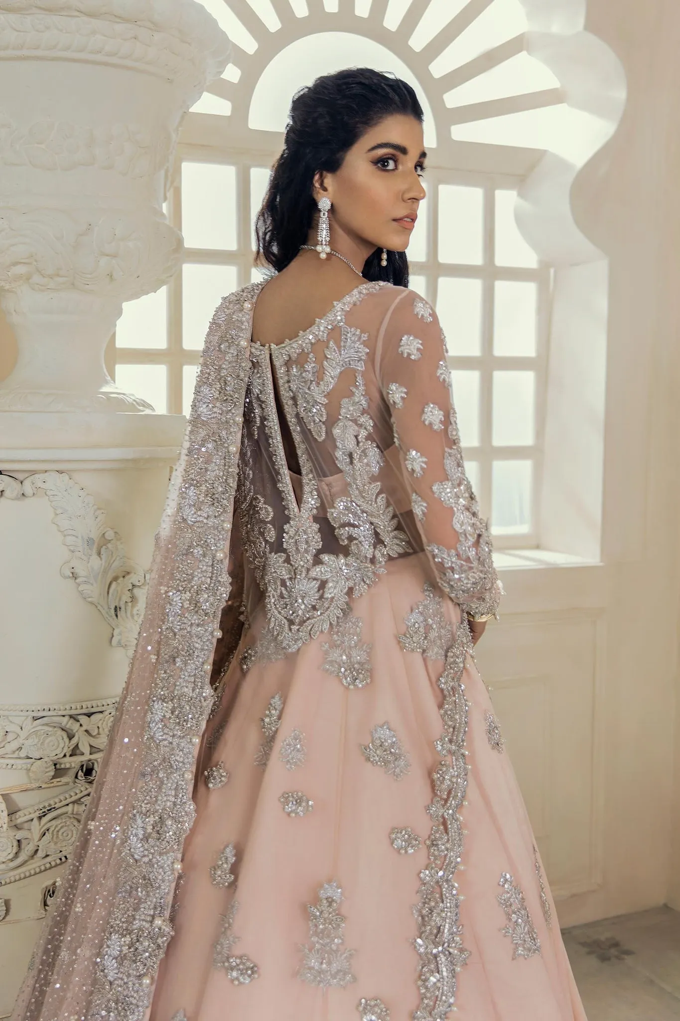 Delicately Embellished Peach Lehenga for Bridal Wear