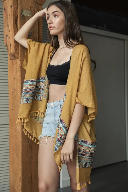 Embroidered Geometric Kimonos.