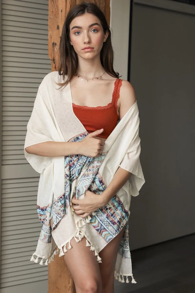 Embroidered Geometric Kimonos.