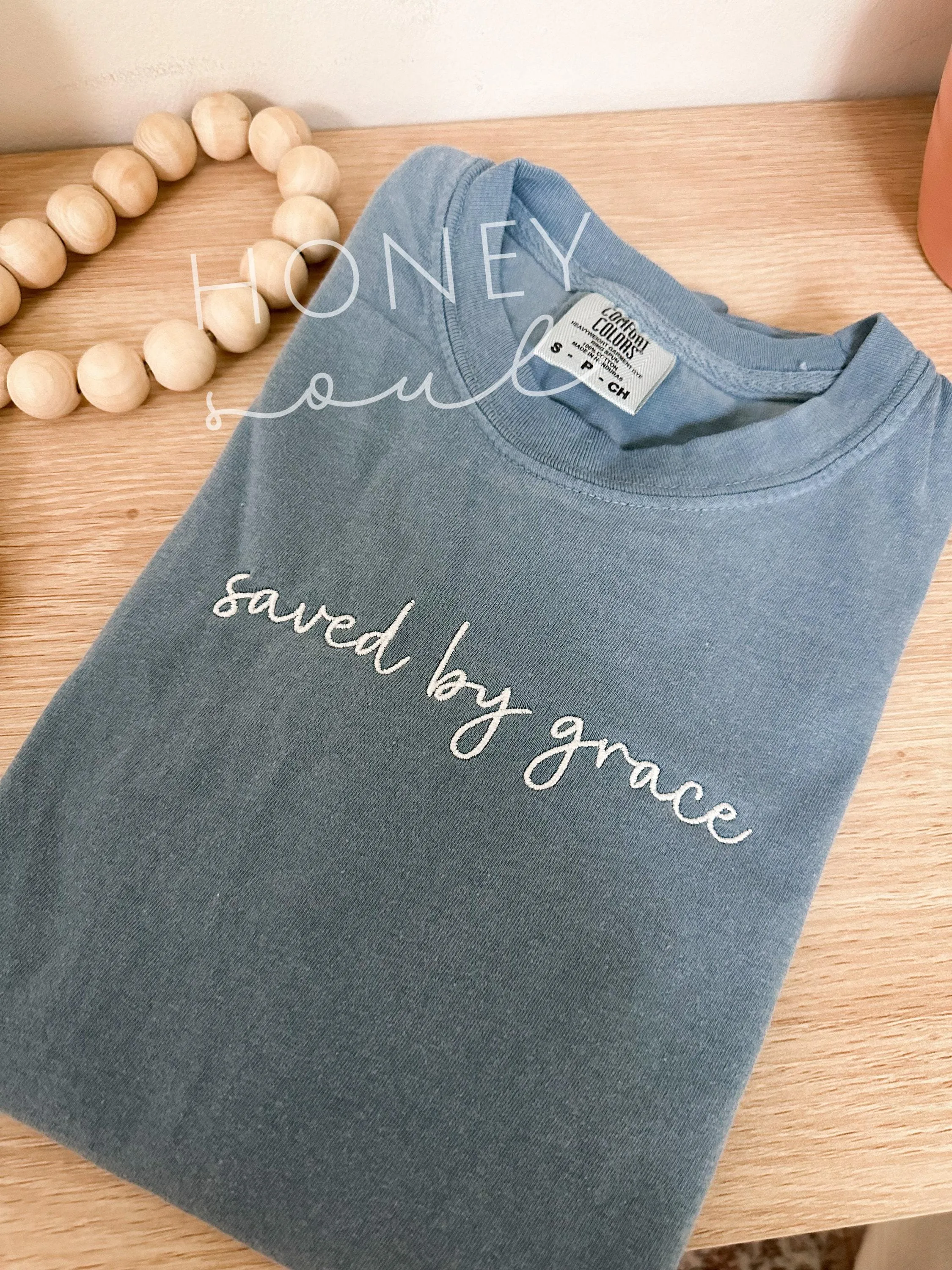 Embroidered saved by grace Tee