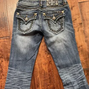 Miss Me Rhinestone‎ embroidered boot cut denim jeans, size 26.