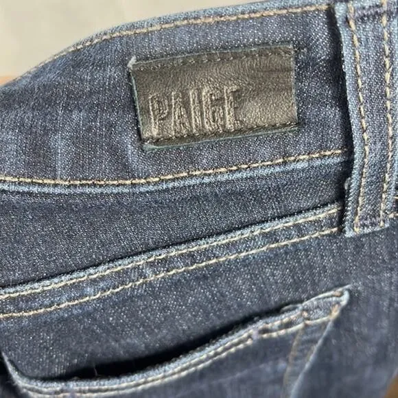 Paige Manhattan Elyse‎ Slim Bootcut Mid Rise Jeans in Dark Wash.
