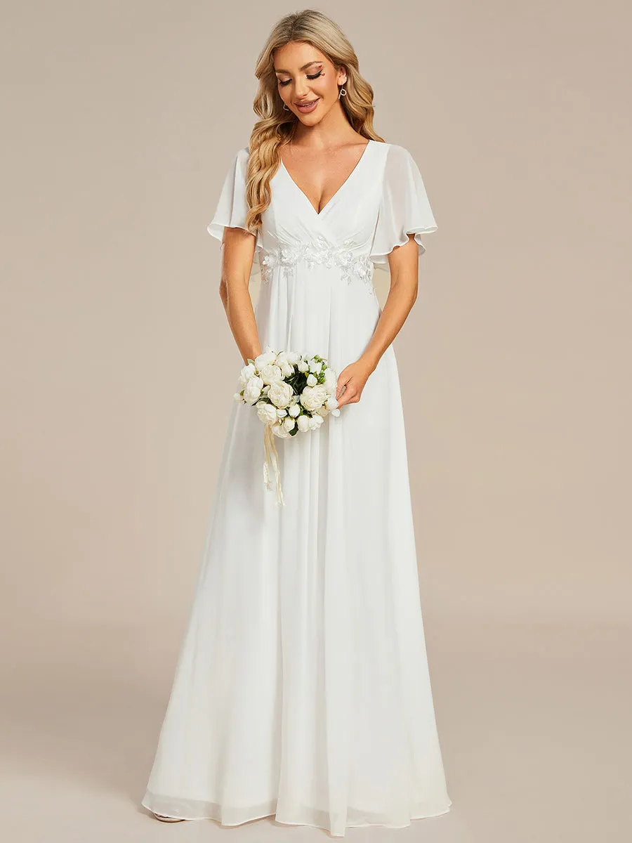Robe de soirée élégante en mousseline de soie avec manches flottantes