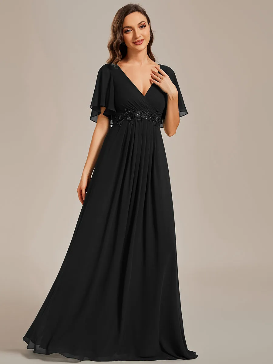 Robe de soirée élégante en mousseline de soie avec manches flottantes