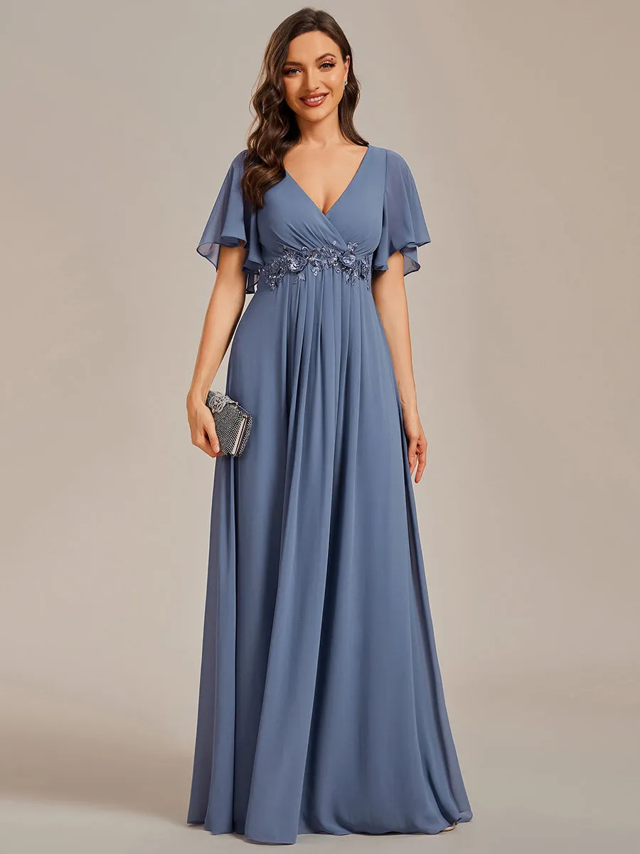 Robe de soirée élégante en mousseline de soie avec manches flottantes