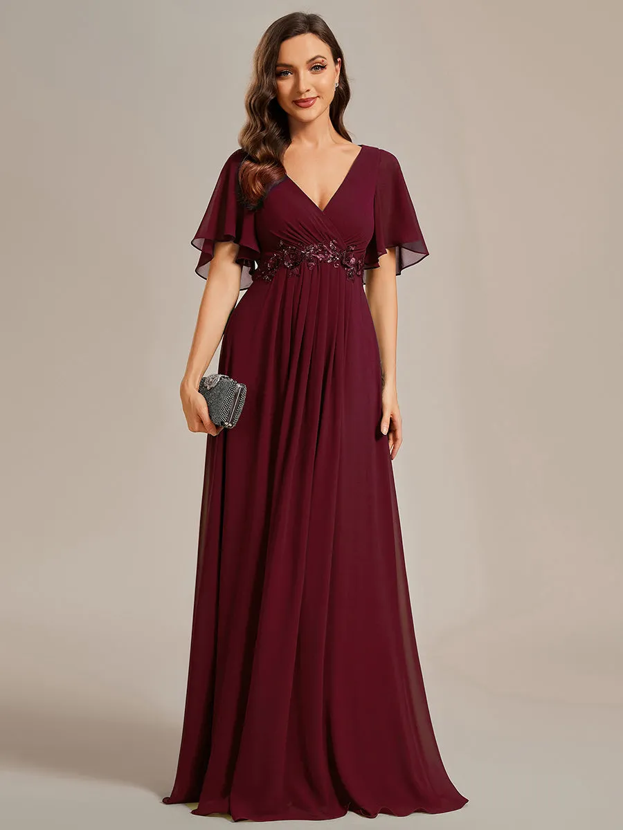 Robe de soirée élégante en mousseline de soie avec manches flottantes
