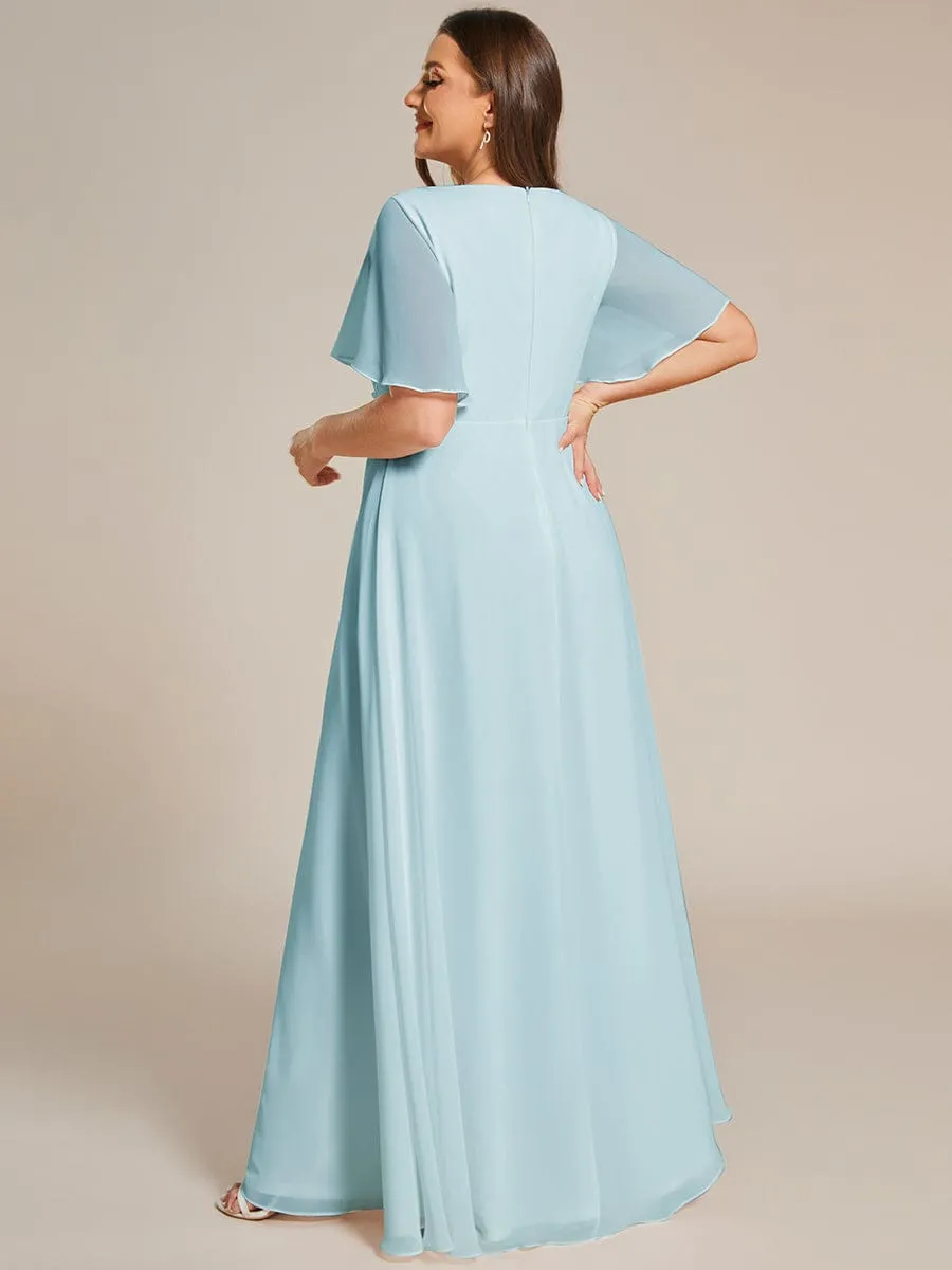 Robe de soirée élégante en mousseline de soie avec manches flottantes