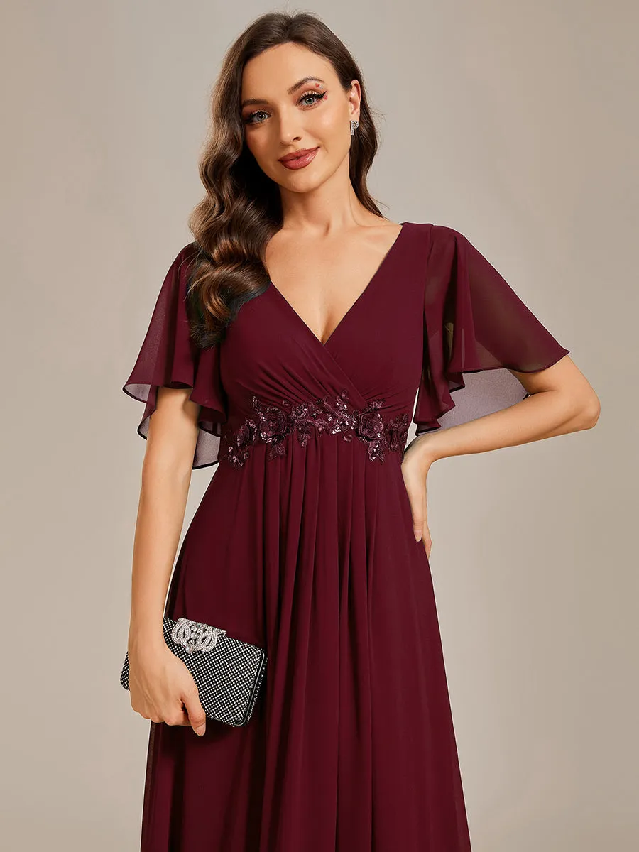Robe de soirée élégante en mousseline de soie avec manches flottantes