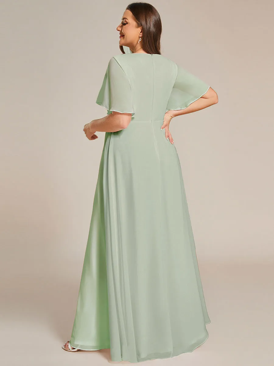 Robe de soirée élégante en mousseline de soie avec manches flottantes