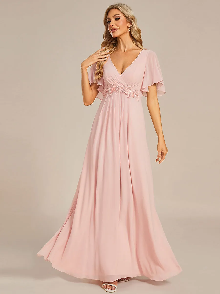 Robe de soirée élégante en mousseline de soie avec manches flottantes