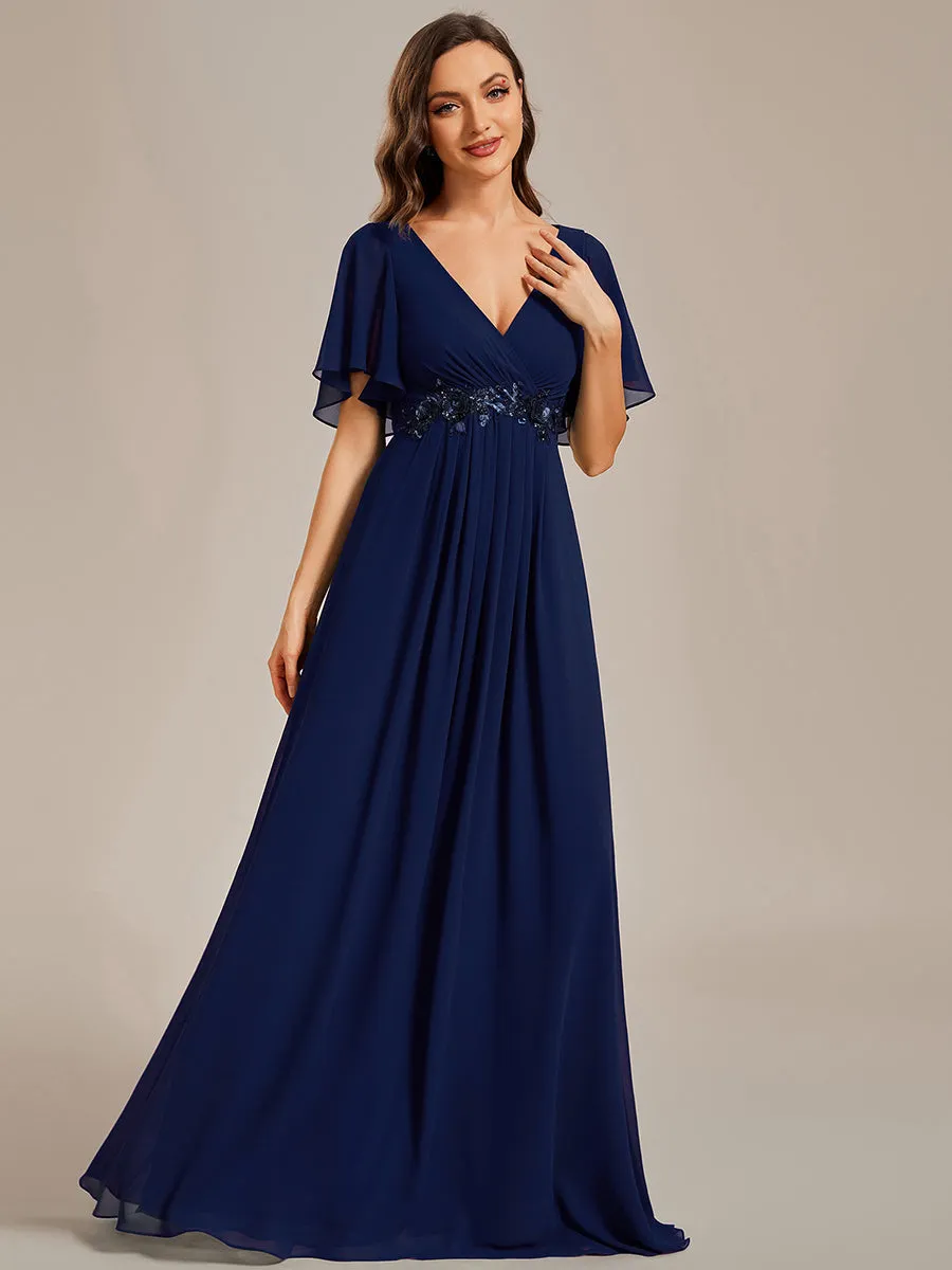 Robe de soirée élégante en mousseline de soie avec manches flottantes