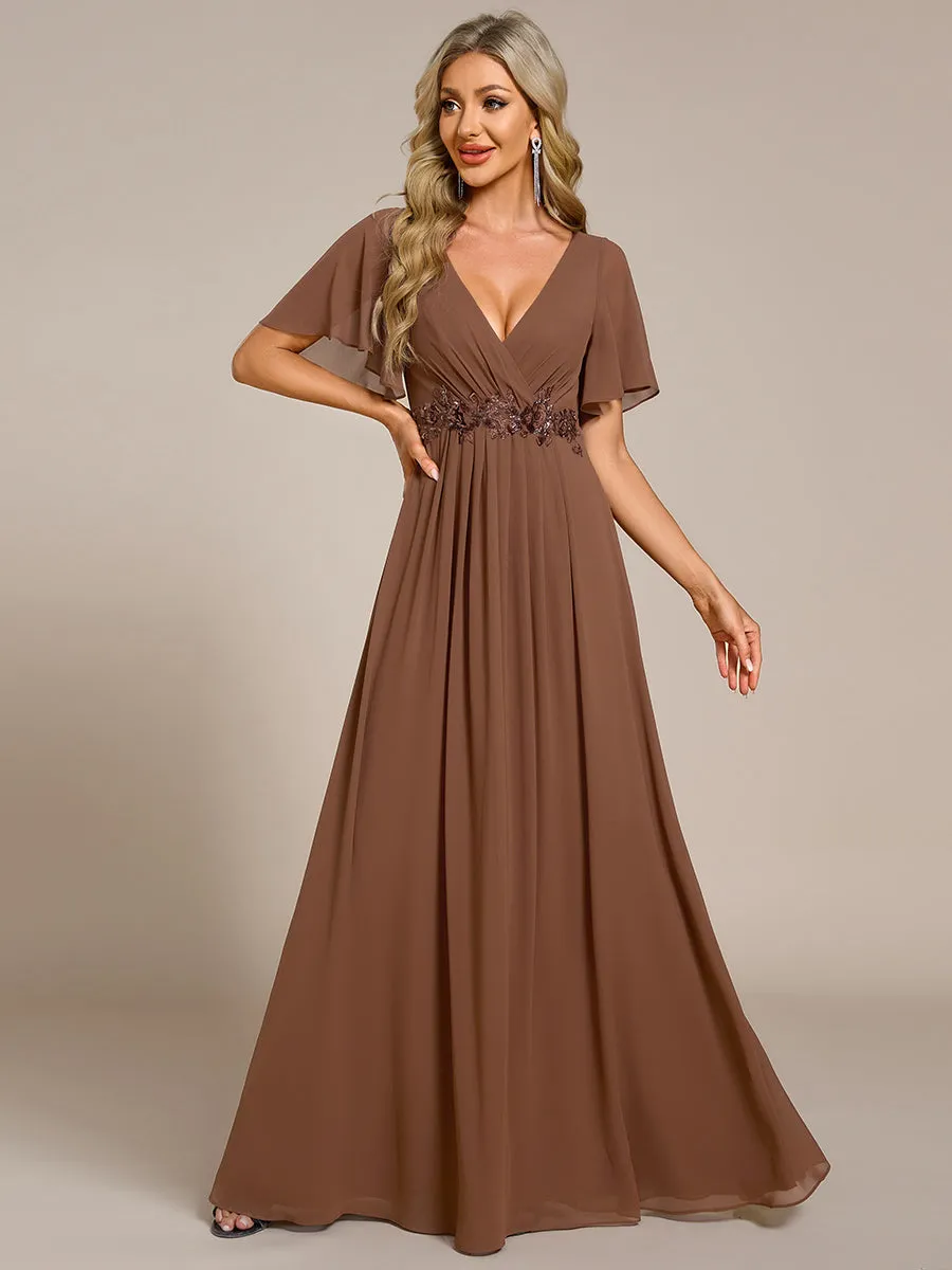 Robe de soirée élégante en mousseline de soie avec manches flottantes