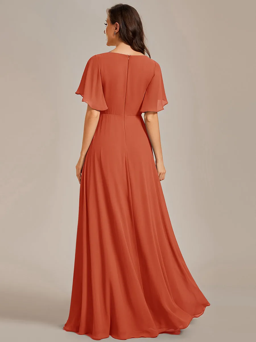 Robe de soirée élégante en mousseline de soie avec manches flottantes