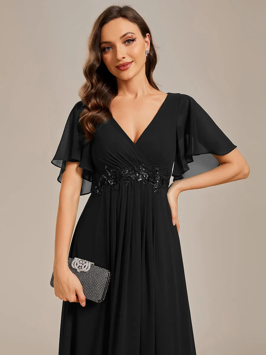 Robe de soirée élégante en mousseline de soie avec manches flottantes