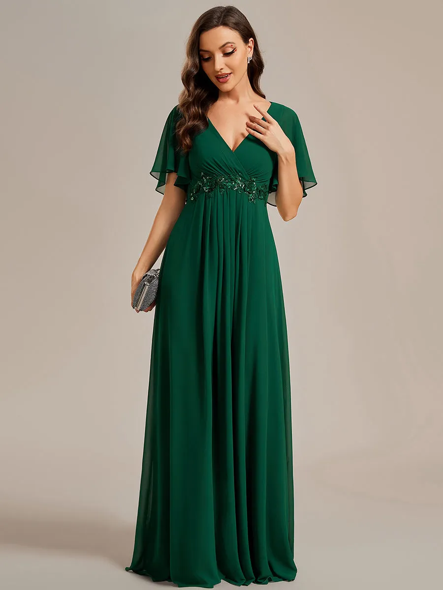 Robe de soirée élégante en mousseline de soie avec manches flottantes