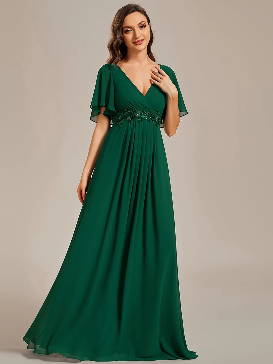 Robe de soirée élégante en mousseline de soie avec manches flottantes