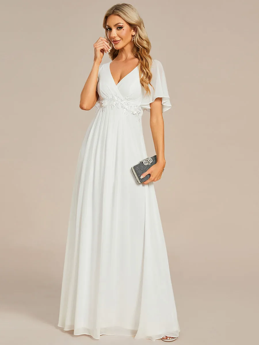 Robe de soirée élégante en mousseline de soie avec manches flottantes