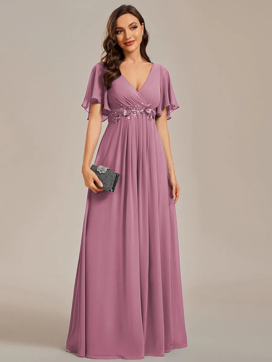 Robe de soirée élégante en mousseline de soie avec manches flottantes