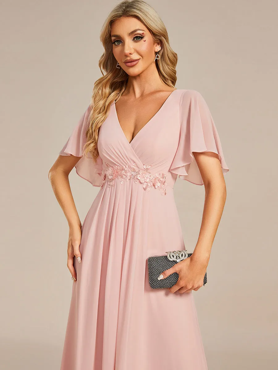 Robe de soirée élégante en mousseline de soie avec manches flottantes