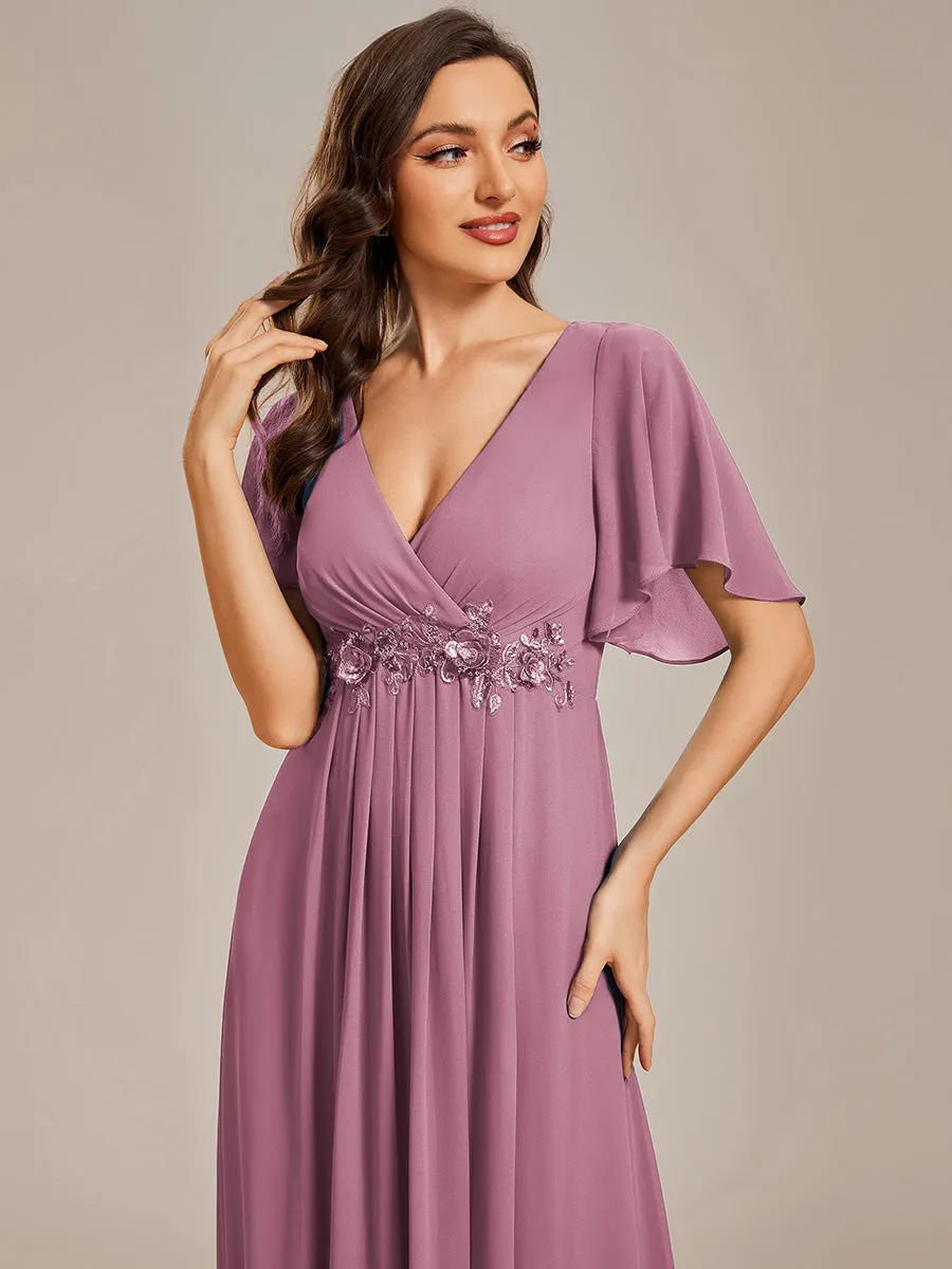 Robe de soirée élégante en mousseline de soie avec manches flottantes