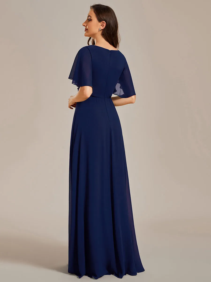 Robe de soirée élégante en mousseline de soie avec manches flottantes