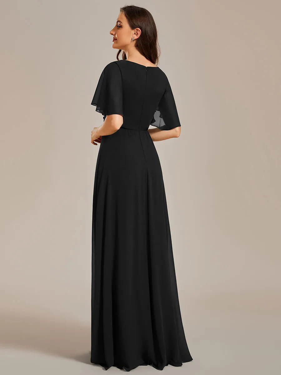 Robe de soirée élégante en mousseline de soie avec manches flottantes