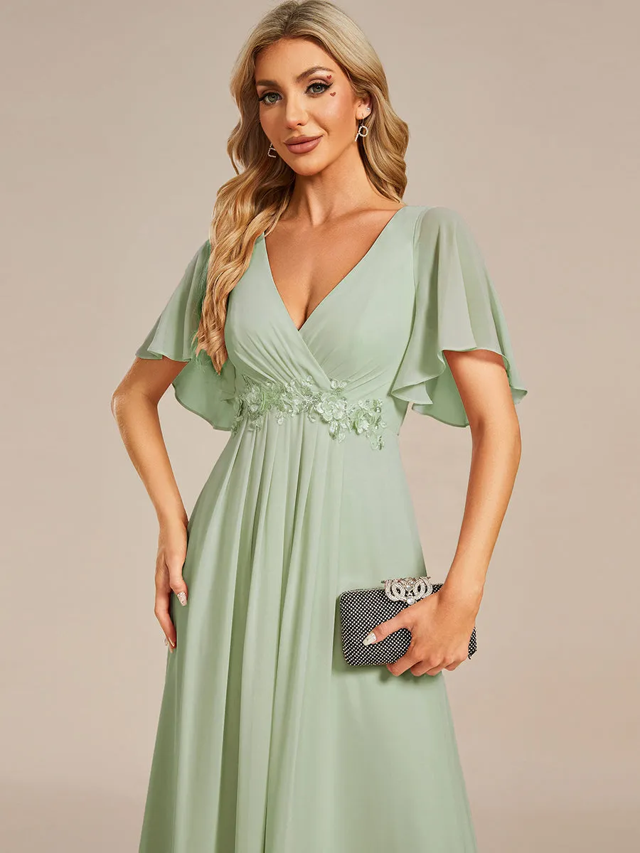 Robe de soirée élégante en mousseline de soie avec manches flottantes