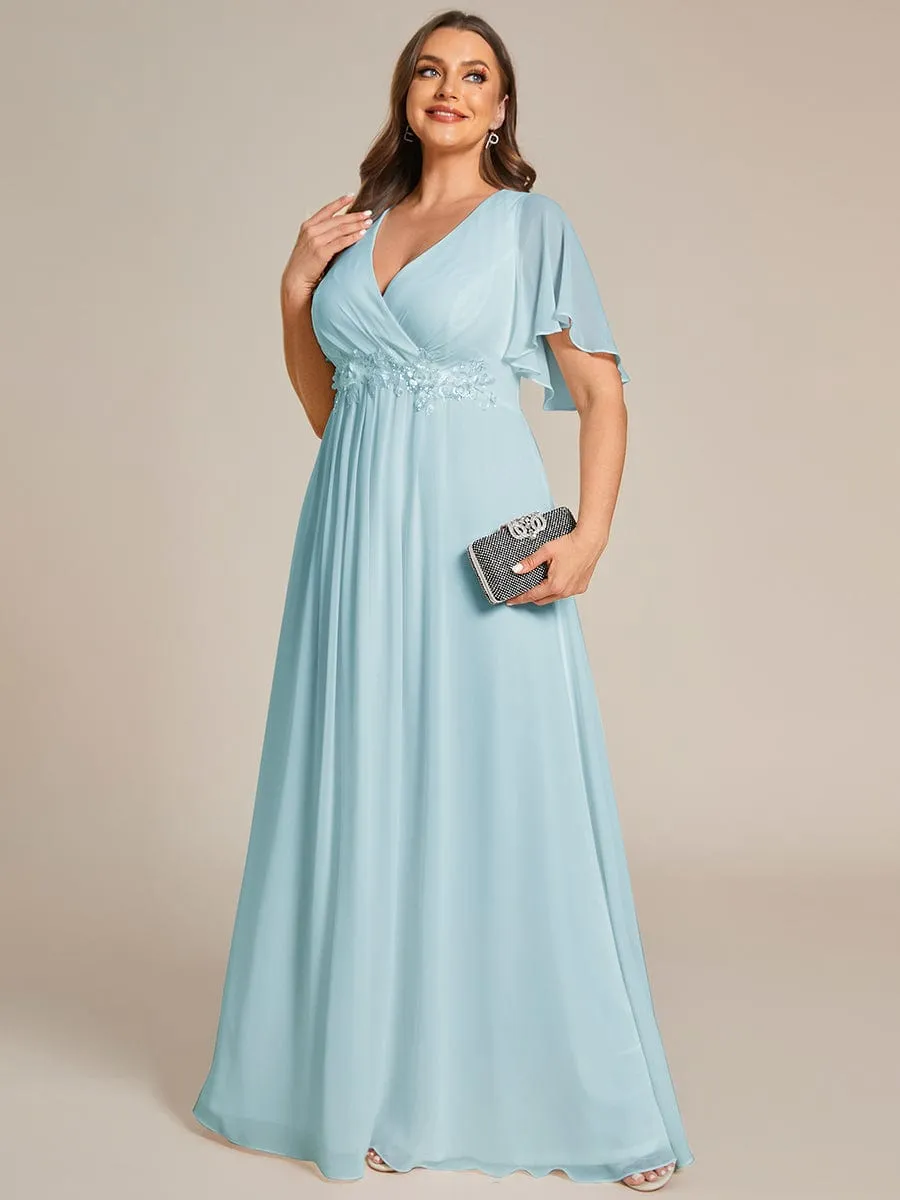 Robe de soirée élégante en mousseline de soie avec manches flottantes