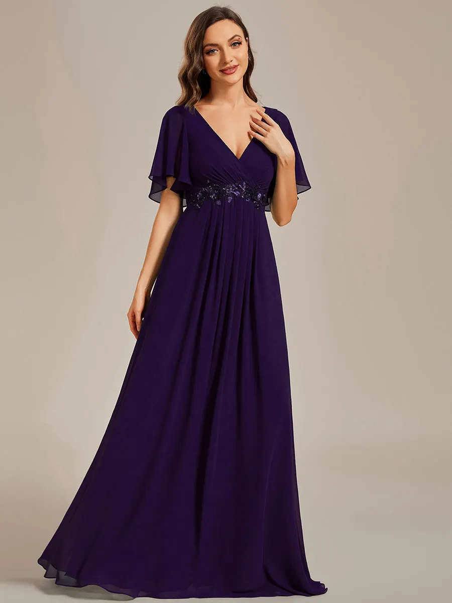 Robe de soirée élégante en mousseline de soie avec manches flottantes