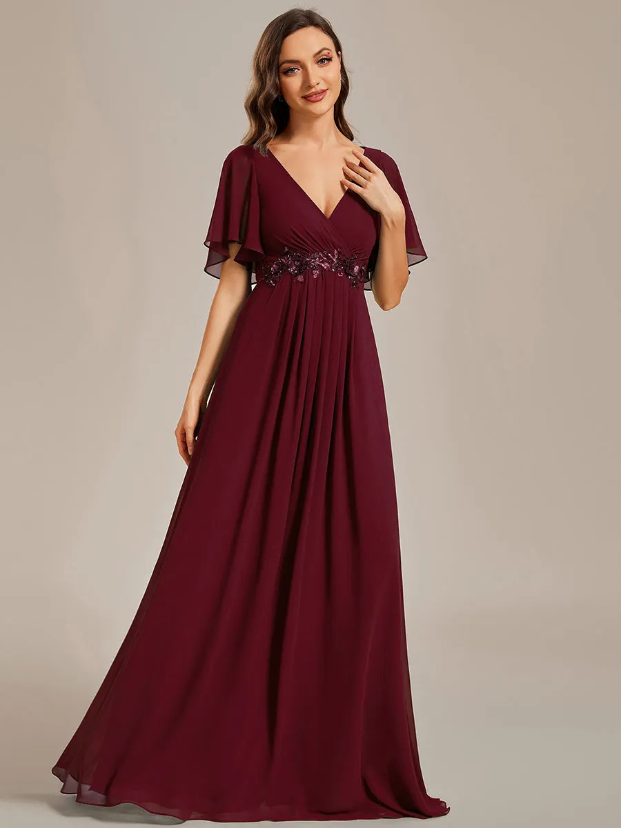 Robe de soirée élégante en mousseline de soie avec manches flottantes