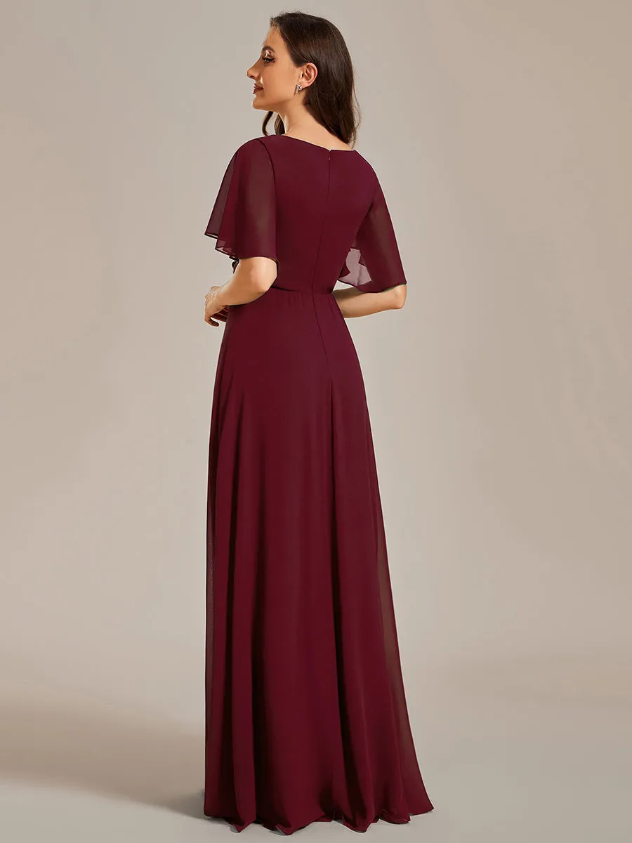 Robe de soirée élégante en mousseline de soie avec manches flottantes