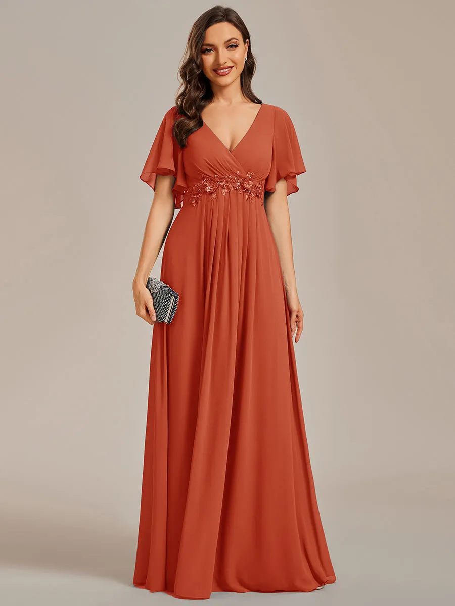 Robe de soirée élégante en mousseline de soie avec manches flottantes