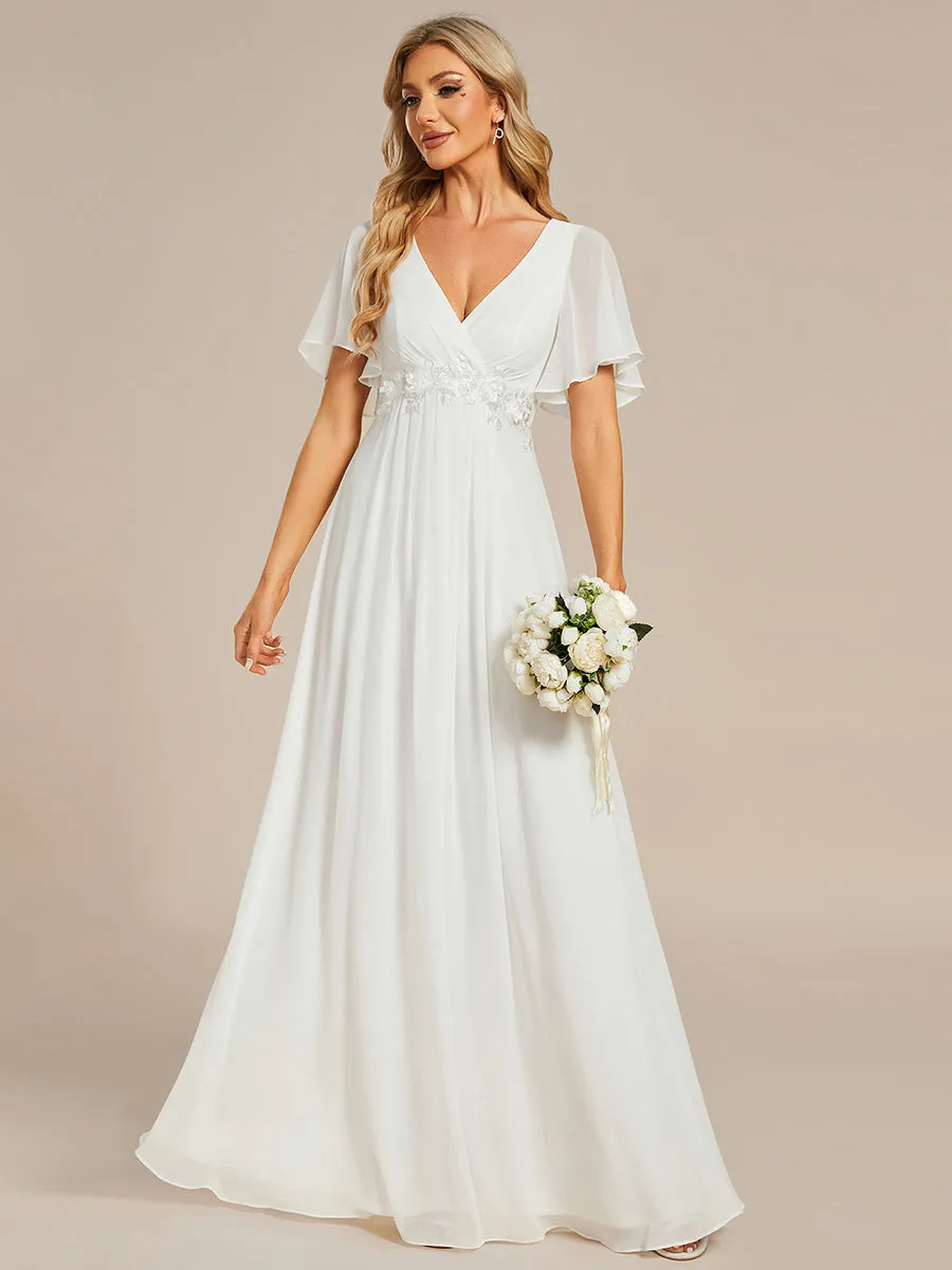 Robe de soirée élégante en mousseline de soie avec manches flottantes