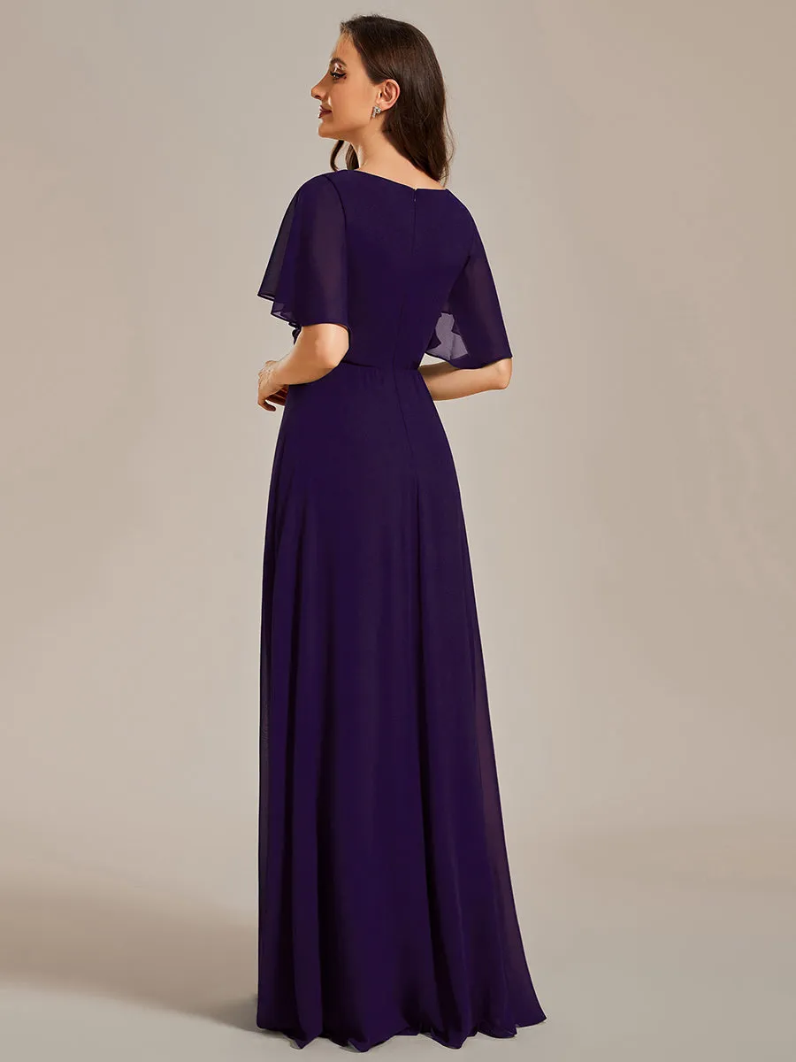 Robe de soirée élégante en mousseline de soie avec manches flottantes