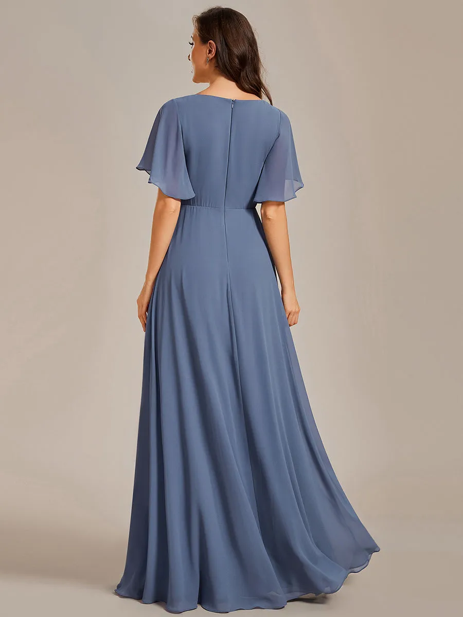 Robe de soirée élégante en mousseline de soie avec manches flottantes