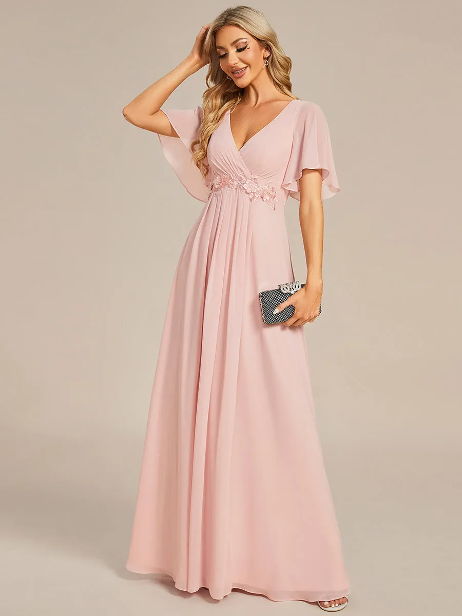 Robe de soirée élégante en mousseline de soie avec manches flottantes