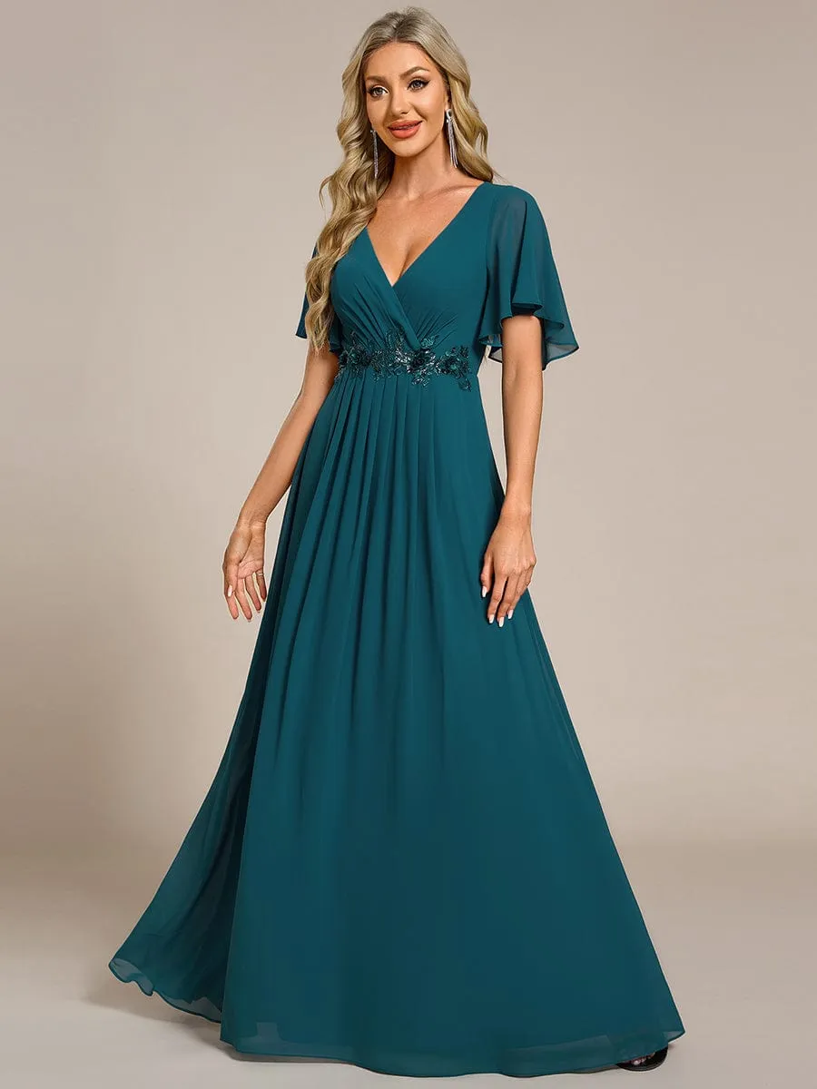 Robe de soirée élégante en mousseline de soie avec manches flottantes