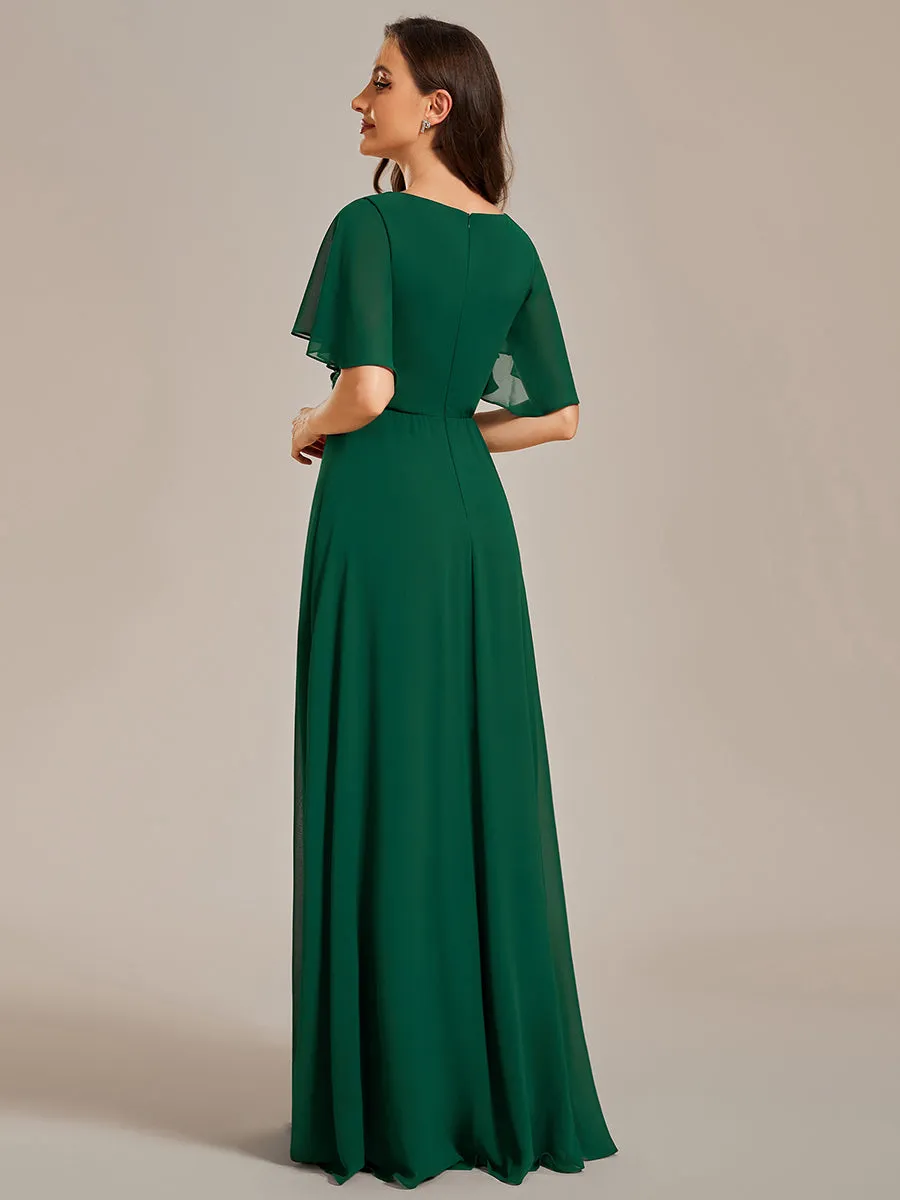 Robe de soirée élégante en mousseline de soie avec manches flottantes