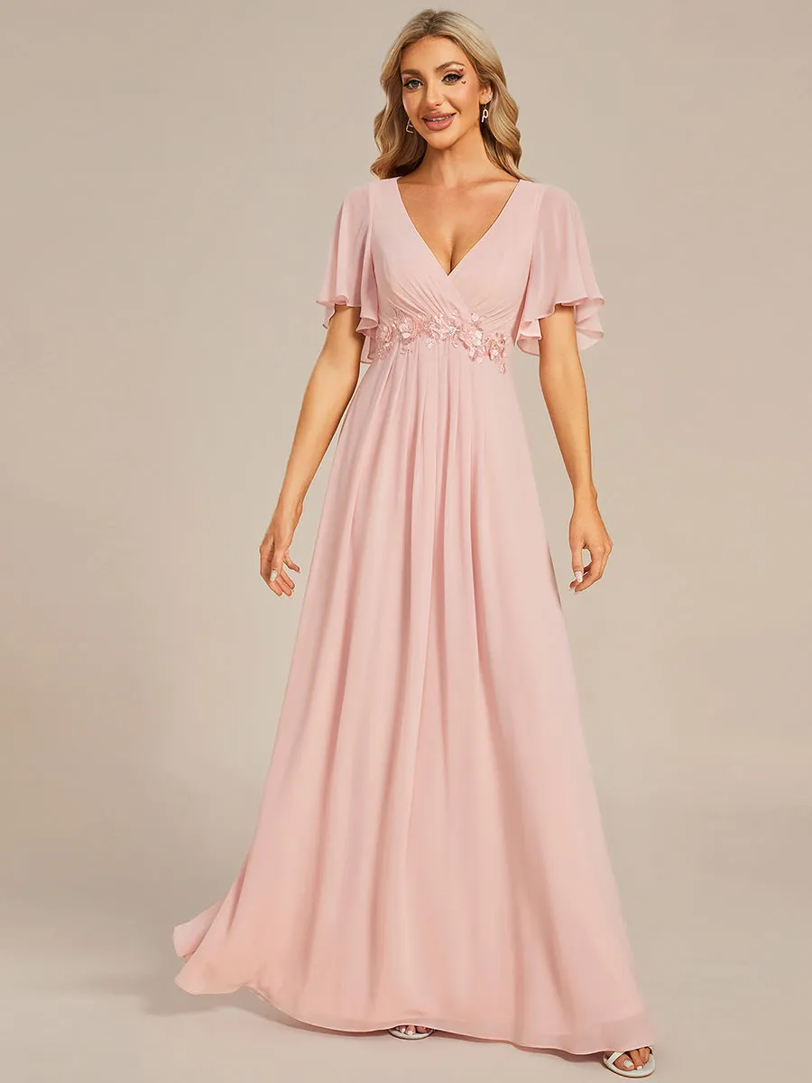 Robe de soirée élégante en mousseline de soie avec manches flottantes