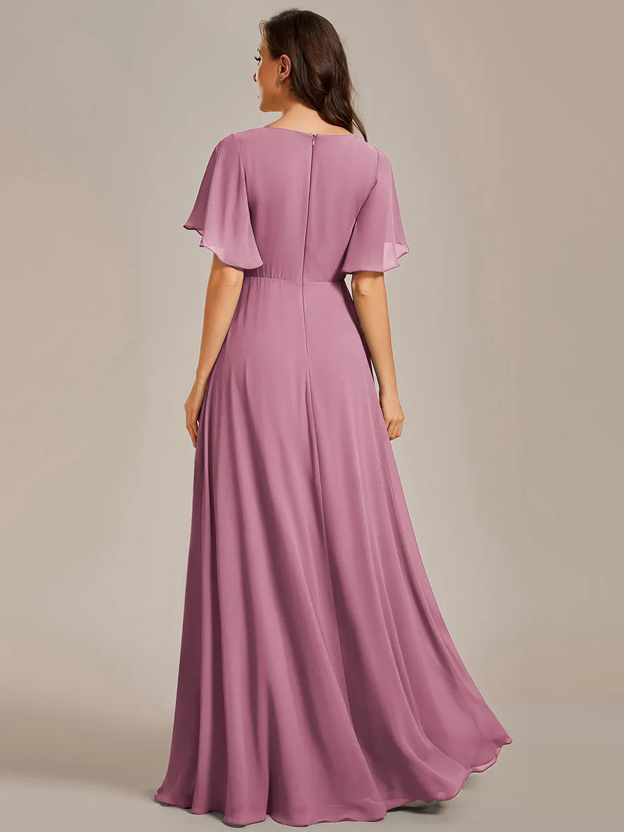 Robe de soirée élégante en mousseline de soie avec manches flottantes