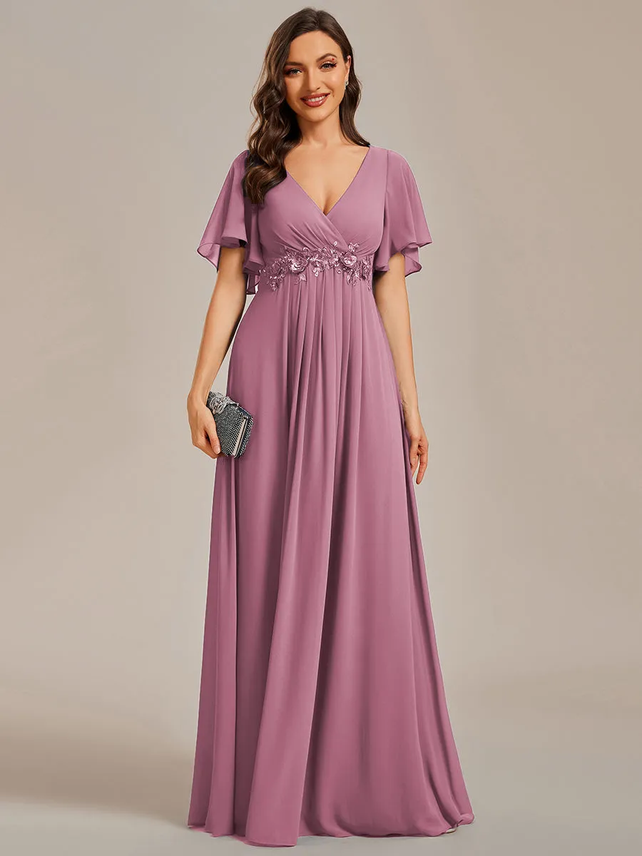 Robe de soirée élégante en mousseline de soie avec manches flottantes