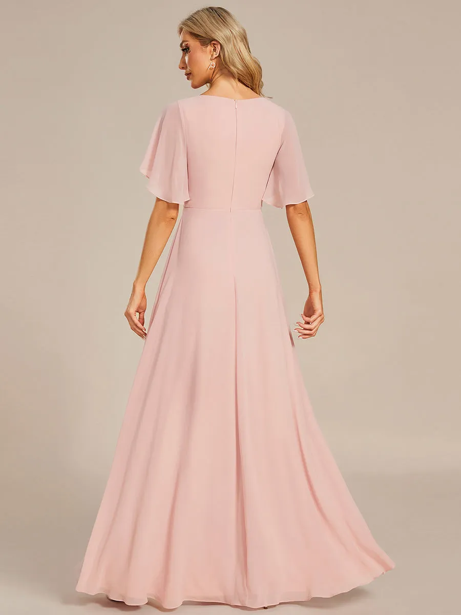 Robe de soirée élégante en mousseline de soie avec manches flottantes