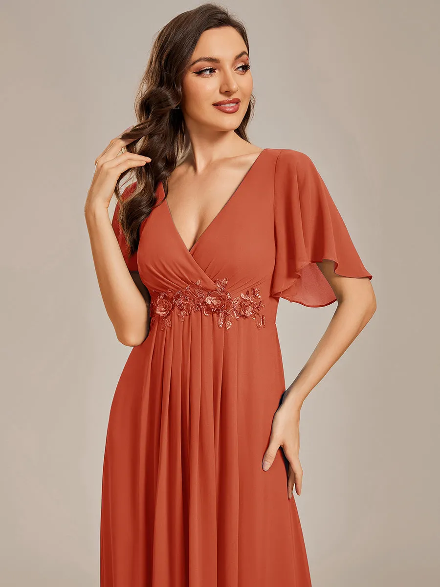 Robe de soirée élégante en mousseline de soie avec manches flottantes