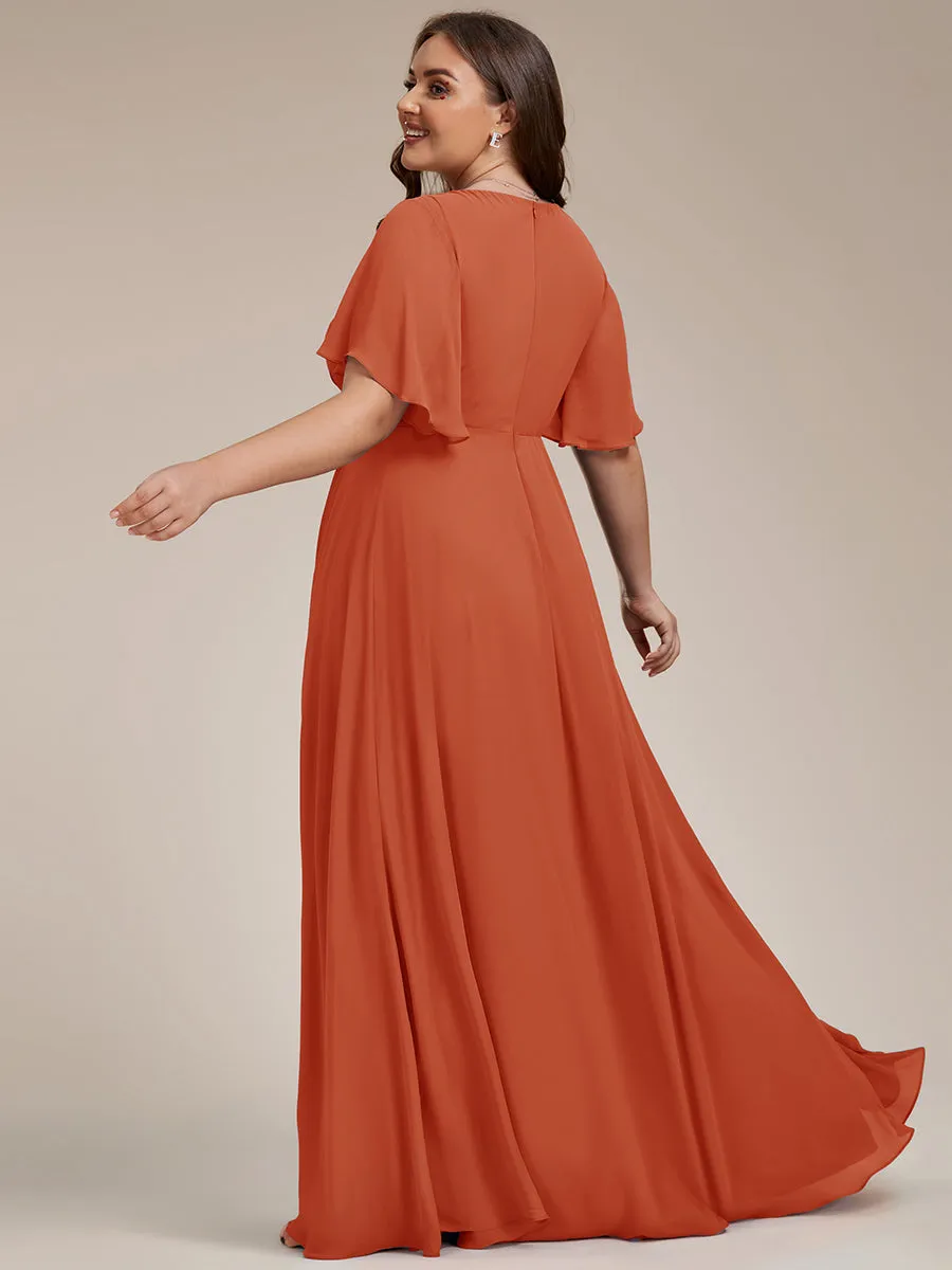 Robe de soirée élégante en mousseline de soie avec manches flottantes